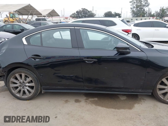2021 Mazda 3 Premium with VIN JM1BPADL4M1329041, listed as a IAAI auction lot 42291604 with 93,248 mi miles and . Bid and sale history available at DreamBid. Image 14.