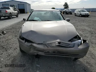 1999 Toyota Camry LE с VIN 4T1BG22K3XU536230, выставлен на аукционе Copart как лот 58992755 с пробегом Не указан миль и Списание • Salvage title. История ставок и продаж доступна на DreamBid. Изображение 5.