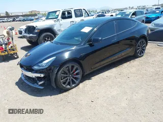 2020 Tesla Model 3 Performance z VIN 5YJ3E1EC5LF641593, wystawiony jako IAAI lot #42153291 z przebiegiem 70 264 mil mil oraz . Historia ofert i sprzedaży dostępna na DreamBid. Obrazek 2.
