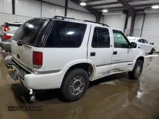 2001 GMC Jimmy SLT with VIN 1GKDT13W112100391, listed as a Copart auction lot 86098014 with 145,700 mi miles and Salvage Title. Bid and sale history available at carsss.com. Image 3.