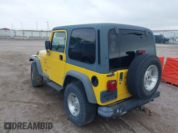 2000 Jeep Wrangler Sport with VIN 1J4FA49S3YP781614, listed as a IAAI auction lot 42292668 with 152,600 mi miles and . Bid and sale history available at DreamBid. Image 12.