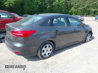 2018 Ford Focus S with VIN 1FADP3E29JL215097, listed as a IAAI auction lot 41457843 with 115,891 mi miles. Bid and sale history available at carsss.com. Image 4.