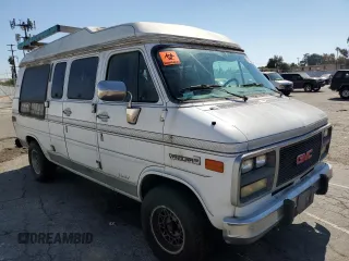 1994 GMC Vandura z VIN 1GDEG25KXRF519134, wystawiony jako Copart lot #75056124 z przebiegiem 245 597 mil mil oraz Szkody całkowita. Historia ofert i sprzedaży dostępna na DreamBid. Obrazek 4.