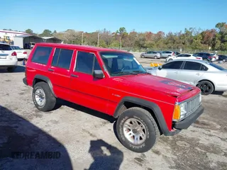 1996 Jeep Cherokee SE z VIN 1J4FT28S0TL225891, wystawiony jako IAAI lot #41411705 z przebiegiem 233 983 mil mil oraz . Historia ofert i sprzedaży dostępna na DreamBid. Obrazek 1.
