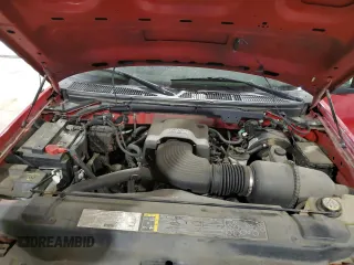 2003 Ford F-150 XL z VIN 2FTRF18W93CB06996, wystawiony jako Copart lot #42758725 z przebiegiem 142 428 mil mil oraz Szkoda całkowita • Salvage title. Historia ofert i sprzedaży dostępna na DreamBid. Obrazek 11.