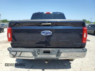 2021 Ford F-150 XL with VIN 1FTFW1E5XMFA47980, listed as a Copart auction lot 56737215 with 63,781 mi miles and Salvage title. Bid and sale history available at DreamBid. Image 6.