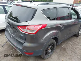 2014 Ford Escape SE with VIN 1FMCU9GX8EUA65568, listed as a IAAI auction lot 42435114 with 128,278 mi miles and . Bid and sale history available at DreamBid. Image 4.