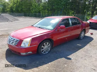 2006 Cadillac DTS 1SC z VIN 1G6KD57YX6U188066, wystawiony jako IAAI lot #42300335 z przebiegiem 110 774 mil mil oraz . Historia ofert i sprzedaży dostępna na DreamBid. Obrazek 2.