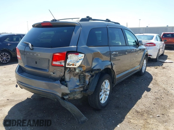 2013 Dodge Journey SXT with VIN 3C4PDDBGXDT650886, listed as a IAAI auction lot 41864331 with 224,579 mi miles and . Bid and sale history available at DreamBid. Image 4.