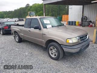2003 Mazda B-Series 2WD Truck SE with VIN 4F4YR46VX3TM16294, listed as a IAAI auction lot 42034107 with 165,007 mi miles. Bid and sale history available at carsss.com. Image 1.