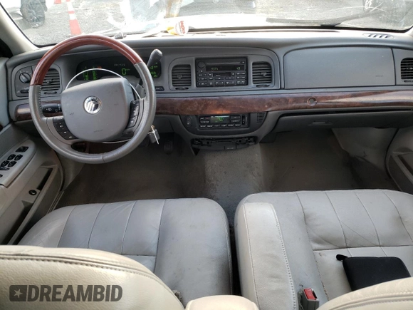 2005 Mercury Grand Marquis LS Premium z VIN 2MEHM75WX5X600920, wystawiony jako Copart lot #86592764 z przebiegiem 94 743 mil mil oraz Szkoda całkowita • Salvage title. Historia ofert i sprzedaży dostępna na DreamBid. Obrazek 8.