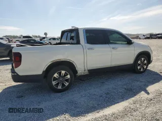 2019 Honda Ridgeline RTL-E with VIN 5FPYK3F72KB021673, listed as a Copart auction lot 50599005 with 65,469 mi miles and Salvage title. Bid and sale history available at DreamBid. Image 3.