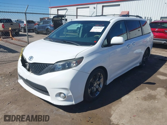 2014 Toyota Sienna SE with VIN 5TDXK3DC0ES477207, listed as a IAAI auction lot 41624619 with 213,881 mi miles and . Bid and sale history available at DreamBid. Image 17.