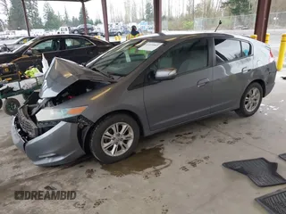 2010 Honda Insight EX with VIN JHMZE2H7XAS034098, listed as a IAAI auction lot 41939869 with 281,689 mi miles and . Bid and sale history available at DreamBid. Image 17.