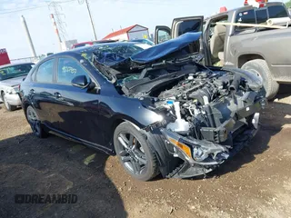 2021 Kia Forte GT-Line z VIN 3KPF34AD4ME307615, wystawiony jako IAAI lot #42267357 z przebiegiem 46 700 mil mil oraz . Historia ofert i sprzedaży dostępna na DreamBid. Obrazek 1.