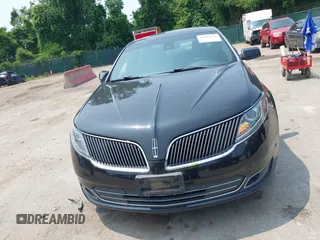 2013 Lincoln MKS EcoBoost with VIN 1LNHL9FT3DG602190, listed as a IAAI auction lot 42483472 with 63,238 mi miles and . Bid and sale history available at DreamBid. Image 12.