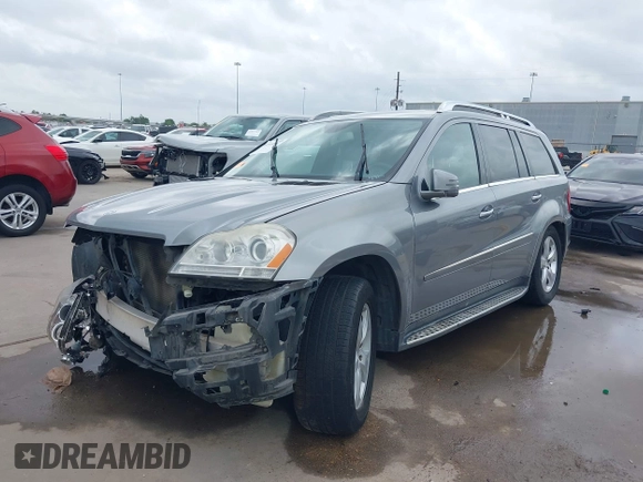 2012 Mercedes-Benz GL-Class GL 450 with VIN 4JGBF7BE9CA794726, listed as a IAAI auction lot 41918937 with 154,393 mi miles. Bid and sale history available at carsss.com. Image 23.