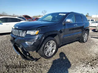 2020 Jeep Grand Cherokee Overland with VIN 1C4RJFCG2LC230688, listed as a Copart auction lot 86249654 with 67,882 mi miles and Salvage Title. Bid and sale history available at carsss.com. Image 1.
