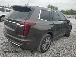 2020 Cadillac XT6 FWD Premium Luxury with VIN 1GYKPCRS4LZ133123, listed as a Copart auction lot 59411115 with 64,463 mi miles and Salvage title. Bid and sale history available at DreamBid. Image 3.