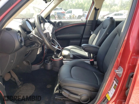 2015 MINI Countryman with VIN WMWZB3C56FWR44186, listed as a Copart auction lot 53636785 with 115,472 mi miles and Salvage Title. Bid and sale history available at DreamBid. Image 7.