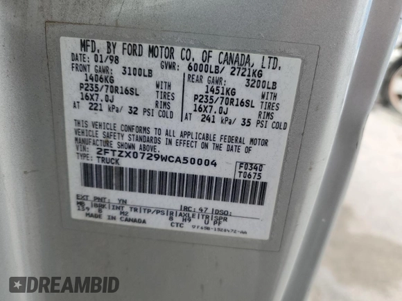 1998 Ford F-150 with VIN 2FTZX0729WCA50004, listed as a Copart auction lot 50028895 with 291,952 mi miles and Salvage title. Bid and sale history available at DreamBid. Image 12.