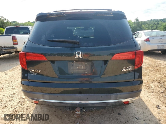 2018 Honda Pilot Elite with VIN 5FNYF6H03JB019900, listed as a Copart auction lot 57497235 with 60,358 mi miles and Salvage title. Bid and sale history available at DreamBid. Image 6.