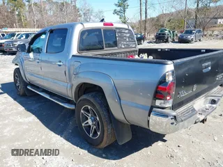 2014 Toyota Tacoma PreRunner with VIN 5TFJU4GNXEX061808, listed as a IAAI auction lot 41585931 with 214,240 mi miles. Bid and sale history available at carsss.com. Image 3.