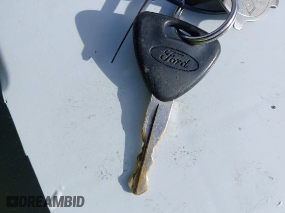 1993 Ford Escort z VIN 3FAPP13J9PR205353, wystawiony jako IAAI lot #41837169 z przebiegiem 4016 mil mil oraz . Historia ofert i sprzedaży dostępna na DreamBid. Obrazek 11.