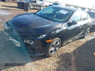 2020 Honda Civic LX with VIN 19XFC2F68LE029699, listed as a IAAI auction lot 41894102 with 113,900 mi miles and . Bid and sale history available at DreamBid. Image 17.