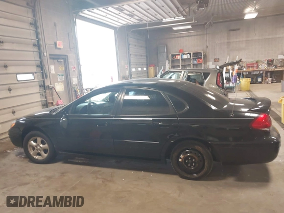 2004 Ford Taurus SE z VIN 1FAFP53U74G107504, wystawiony jako IAAI lot #42068692 z przebiegiem Nie podano mil oraz . Historia ofert i sprzedaży dostępna na DreamBid. Obrazek 14.