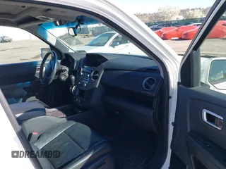 2012 Honda Pilot Touring with VIN 5FNYF4H98CB057659, listed as a IAAI auction lot 41927990 with 140,000 mi miles. Bid and sale history available at carsss.com. Image 5.
