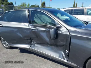 2018 Genesis G80 3.8L z VIN KMHGN4JEXJU283935, wystawiony jako IAAI lot #41750441 z przebiegiem 70 165 mil mil oraz . Historia ofert i sprzedaży dostępna na DreamBid. Obrazek 6.