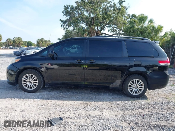 2011 Toyota Sienna XLE AAS with VIN 5TDYK3DC7BS051241, listed as a IAAI auction lot 42214806 with 253,860 mi miles and . Bid and sale history available at DreamBid. Image 14.