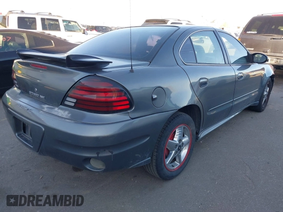 2004 Pontiac Grand Am SE2 with VIN 1G2NG52E94M502077, listed as a IAAI auction lot 41820938 with 217,489 mi miles. Bid and sale history available at carsss.com. Image 4.