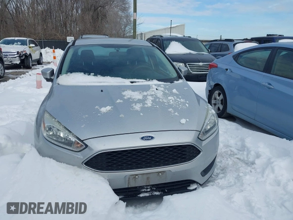 2015 Ford Focus SE z VIN 1FADP3F26FL357140, wystawiony jako IAAI lot #41256854 z przebiegiem 194 812 mil mil oraz . Historia ofert i sprzedaży dostępna na DreamBid. Obrazek 6.