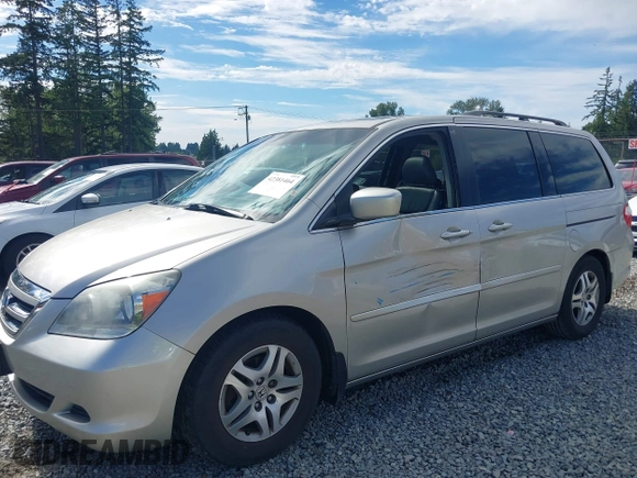 2006 Honda Odyssey EX-L z VIN 5FNRL38726B428227, wystawiony jako IAAI lot #42381464 z przebiegiem 156 623 mil mil oraz . Historia ofert i sprzedaży dostępna na DreamBid. Obrazek 6.