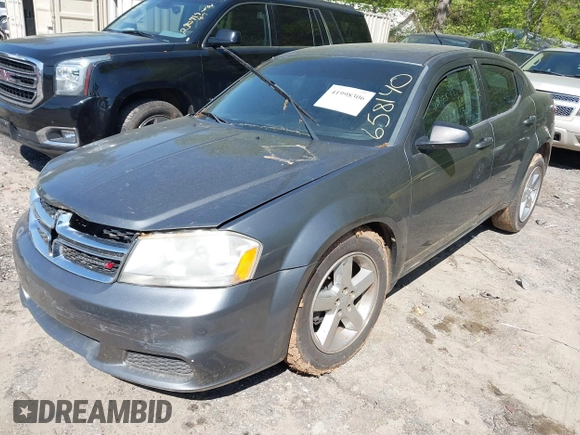 2013 Dodge Avenger SE with VIN 1C3CDZAB1DN658140, listed as a IAAI auction lot 41998306 with 215,548 mi miles. Bid and sale history available at carsss.com. Image 2.