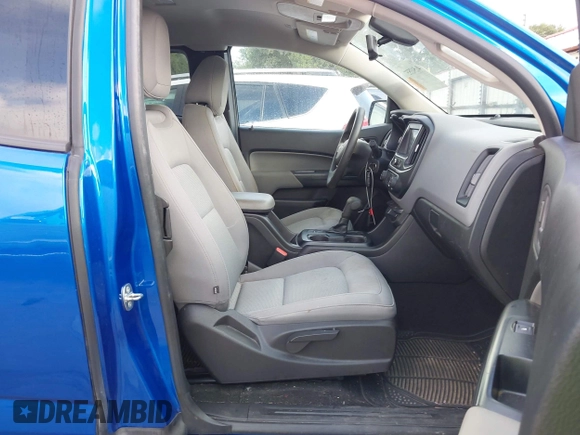 2018 Chevrolet Colorado 2WD Work Truck z VIN 1GCHSBEA8J1300911, wystawiony jako IAAI lot #42543557 z przebiegiem 73 896 mil mil oraz . Historia ofert i sprzedaży dostępna na DreamBid. Obrazek 5.