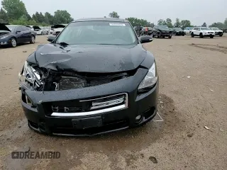 2014 Nissan Maxima SV с VIN 1N4AA5AP7EC486585, выставлен на аукционе Copart как лот 60806895 с пробегом 110 968 миль миль и Списание • Salvage title. История ставок и продаж доступна на DreamBid. Изображение 13.