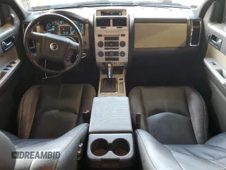 2010 Mercury Mariner Premier with VIN 4M2CN9HG3AKJ25675, listed as a Copart auction lot 64546635 with 99,620 mi miles and Salvage title. Bid and sale history available at DreamBid. Image 8.