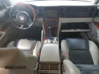 2007 Jeep Commander Overland z VIN 1J8HG68217C564894, wystawiony jako Copart lot #64382215 z przebiegiem 221 815 mil mil oraz Szkoda całkowita • Salvage title. Historia ofert i sprzedaży dostępna na DreamBid. Obrazek 8.