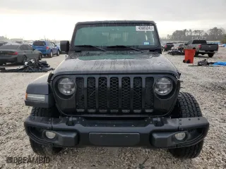 2021 Jeep Gladiator Sport S with VIN 1C6JJTAG7ML590031, listed as a Copart auction lot 43600245 with 56,955 mi miles and Salvage Title. Bid and sale history available at carsss.com. Image 5.