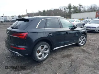 2022 Audi Q5 S line Premium Plus z VIN WA1EAAFY5N2027089, wystawiony jako IAAI lot #39093168 z przebiegiem 24 523 mil mil oraz . Historia ofert i sprzedaży dostępna na DreamBid. Obrazek 4.