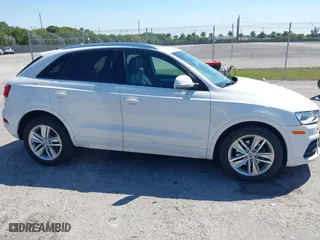 2017 Audi Q3 Premium with VIN WA1BCCFSXHR016914, listed as a IAAI auction lot 41784539 with 94,862 mi miles. Bid and sale history available at carsss.com. Image 13.