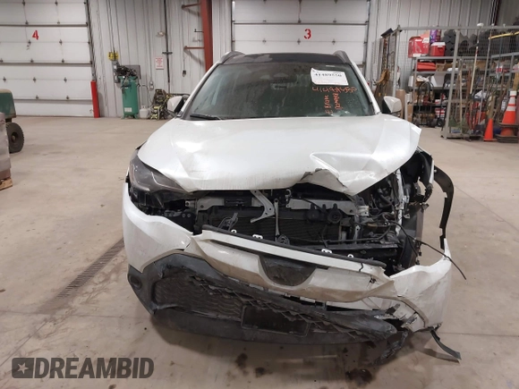2023 Toyota Corolla Cross Hybrid S with VIN 7MUFBABG0PV004809, listed as a IAAI auction lot 41489550 with 59,172 mi miles and . Bid and sale history available at DreamBid. Image 12.