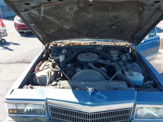 1991 Cadillac Brougham z VIN 1G6DW547XMR708197, wystawiony jako IAAI lot #42112042 z przebiegiem Nie podano mil oraz . Historia ofert i sprzedaży dostępna na DreamBid. Obrazek 10.