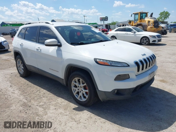 2016 Jeep Cherokee Latitude z VIN 1C4PJMCB9GW305259, wystawiony jako IAAI lot #42093050 z przebiegiem 228 747 mil mil oraz . Historia ofert i sprzedaży dostępna na DreamBid. Obrazek 1.