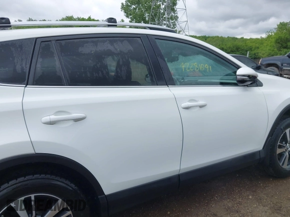 2016 Toyota RAV4 XLE with VIN 2T3RFREV8GW450273, listed as a IAAI auction lot 42281091 with 75,478 mi miles and . Bid and sale history available at DreamBid. Image 13.