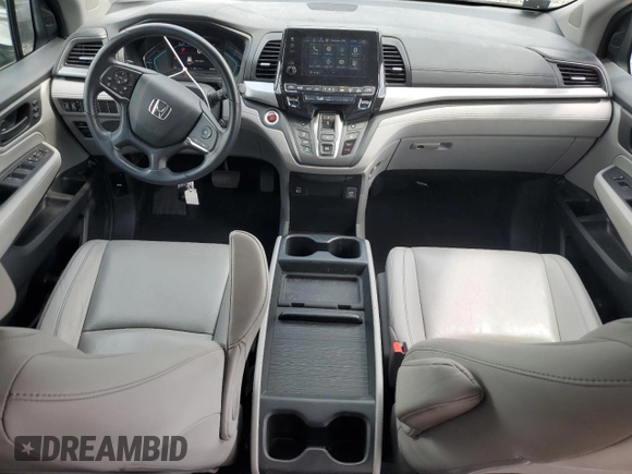 2021 Honda Odyssey EX-L with VIN 5FNRL6H79MB044718, listed as a Copart auction lot 65351134 with 28,888 mi miles and Salvage Title. Bid and sale history available at DreamBid. Image 8.