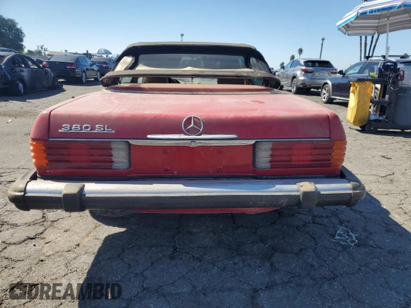 1985 Mercedes-Benz SL with VIN WDBBA45C9FA017476, listed as a Copart auction lot 74177774 with 135,805 mi miles and Salvage title. Bid and sale history available at DreamBid. Image 6.